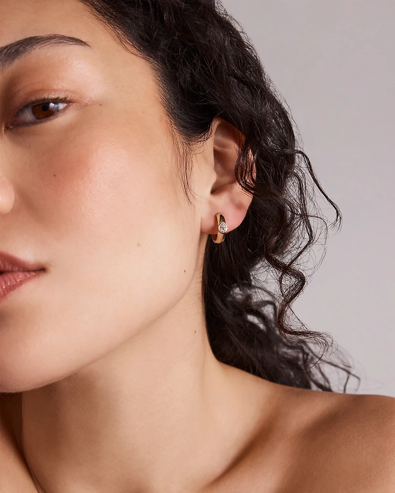 0.50 Carat TW of Laboratory-Grown Pear Cut Diamond Huggie Earrings in 10kt Yellow Gold