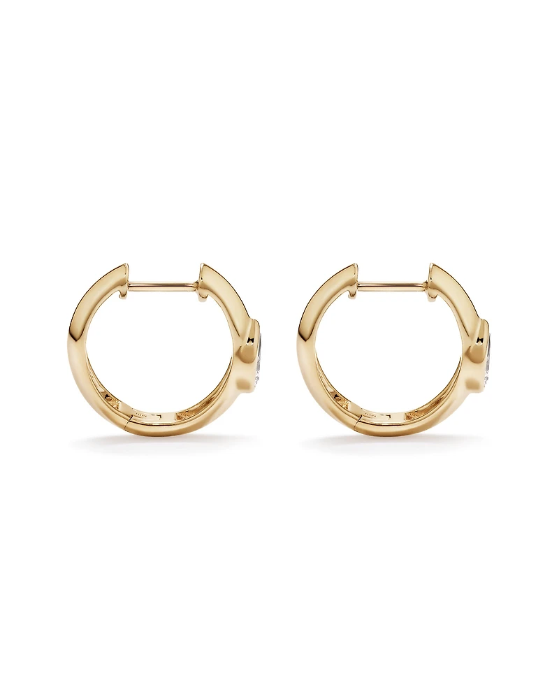 0.50 Carat TW of Laboratory-Grown Pear Cut Diamond Huggie Earrings in 10kt Yellow Gold