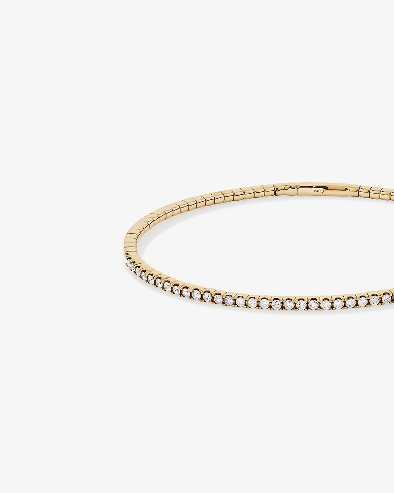 0.68 Carat TW Diamond Row Flex Bangle in 10kt Yellow Gold