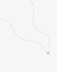 0.23 Carat TW Emerald Diamond Halo Pendant in 10kt White Gold