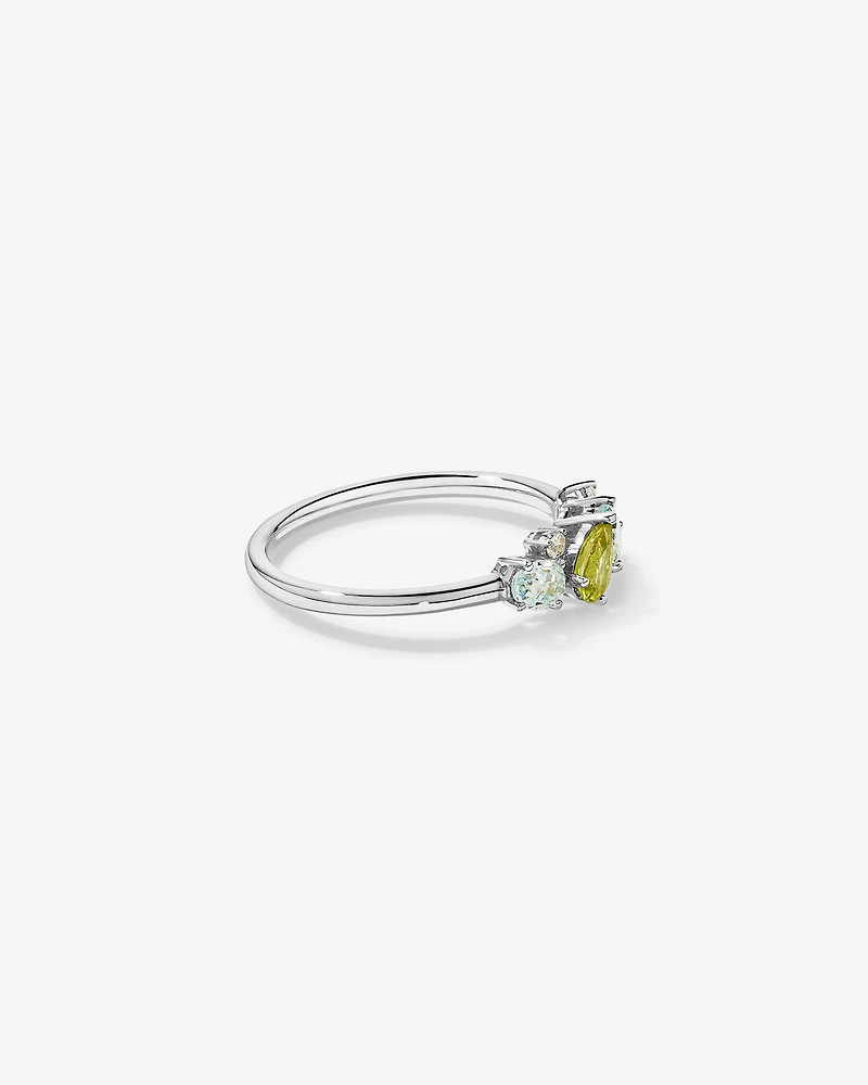 Péridot, topaze bleu ciel, améthyste verte et blanche en or blanc 10 carats