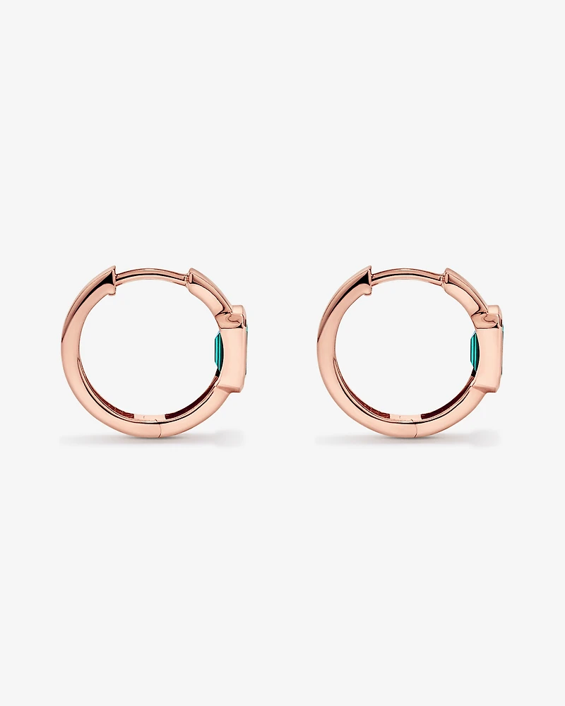 Created Emerald Bezel Huggie Earrings in 10kt Rose Gold