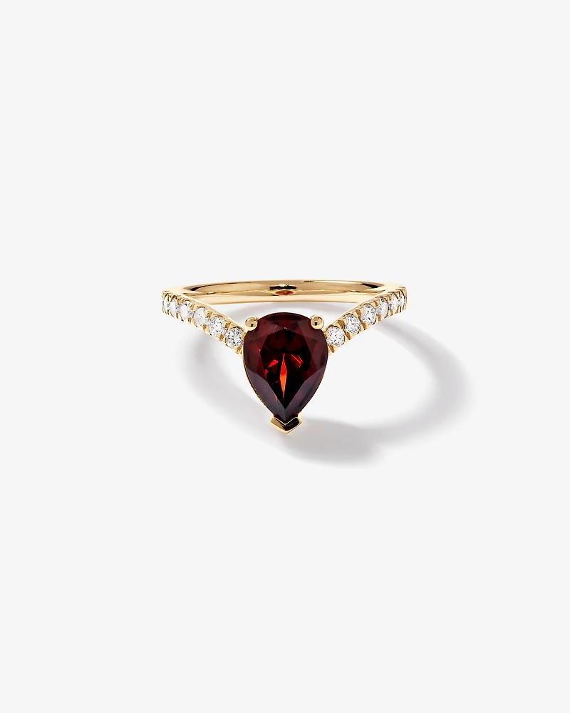 Pear-Cut Garnet Chevron Ring and 0.25 Carat TW of Round Diamonds in 10kt Yellow Gold