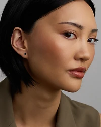 Stud Earrings with London Blue Topaz in 10kt Yellow Gold