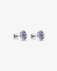 Oval Cut Blue Tanzanite Gemstone and 0.12 Carat TW Diamond Halo Stud Earrings in 10kt White Gold