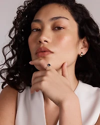 Oval Cut Blue Created Sapphire and Lab-Grown Diamond Halo Ring in 10kt Yellow Gold and Rhodium