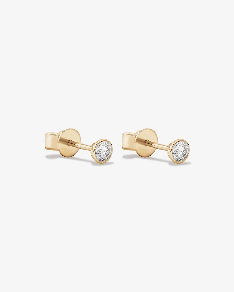0.25 Carat TW Round Brilliant Diamond Solitaire Bezel Set Stud Earrings in 18kt Yellow Gold