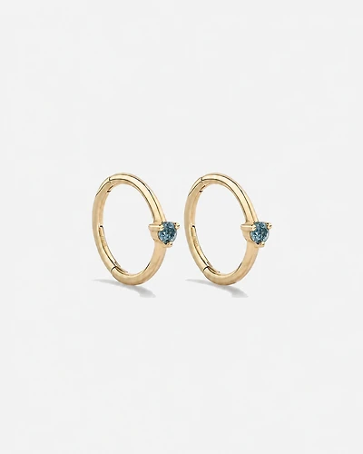 10mm Blue Topaz Accent Sleepers in 10kt Yellow Gold