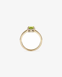 Bague halo Péridot taille émeraude avec diamants en or jaune 10 ct