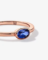 Oval Blue Created Sapphire East-to-West Set Bezel Ring 10kt Rose Gold