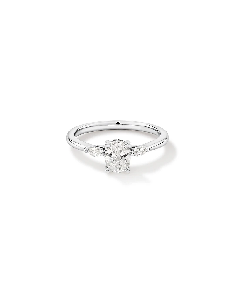 0.77 Carat TW Three Stone Oval and Marquise Cut Hidden Halo Engagement Ring in Platinum