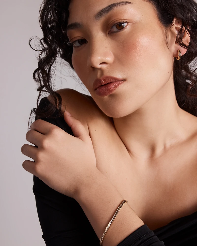 LAB. Tennis Bracelet with 2.95 Carat TW Emerald Cut Laboratory-Grown Diamonds in 10kt Yellow Gold