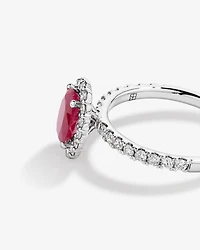 Oval Cut Red Ruby Gemstone and 0.60 Carat TW Diamond Halo Ring in 14kt White Gold