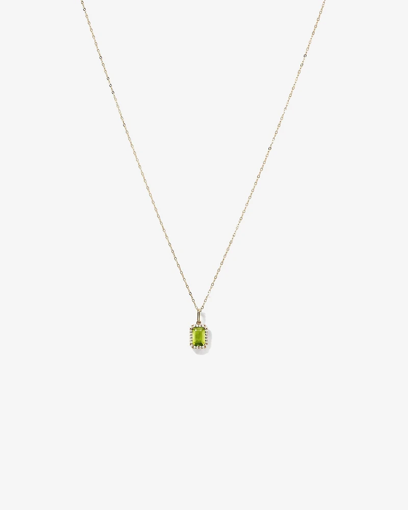Pendentif halo Péridot taille émeraude avec diamants et chaîne en or jaune 10 ct