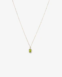 Pendentif halo Péridot taille émeraude avec diamants et chaîne en or jaune 10 ct