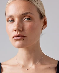 Pendentif rond TW à lunette brillante de 0,25 carat en or blanc 18 carats