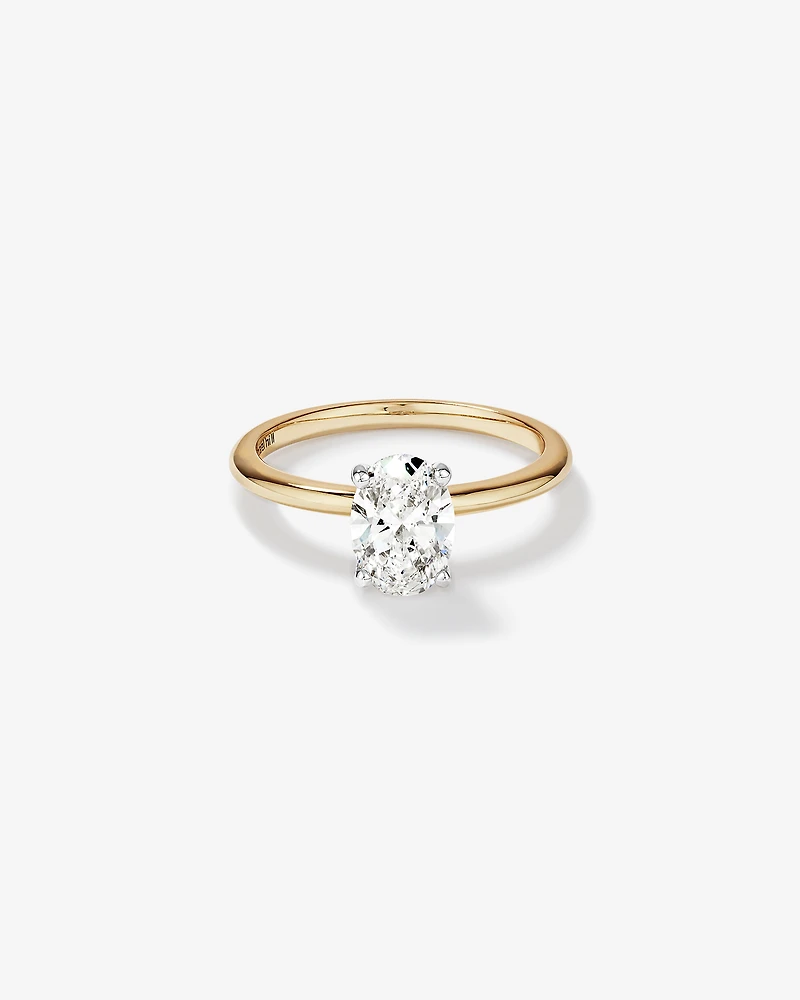 1.25 Carat TW Oval Laboratory-Grown Diamond Solitaire Engagement Ring 14kt Yellow and White Gold