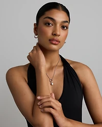 Pendentif boussole rond avec accents de diamants en argent sterling