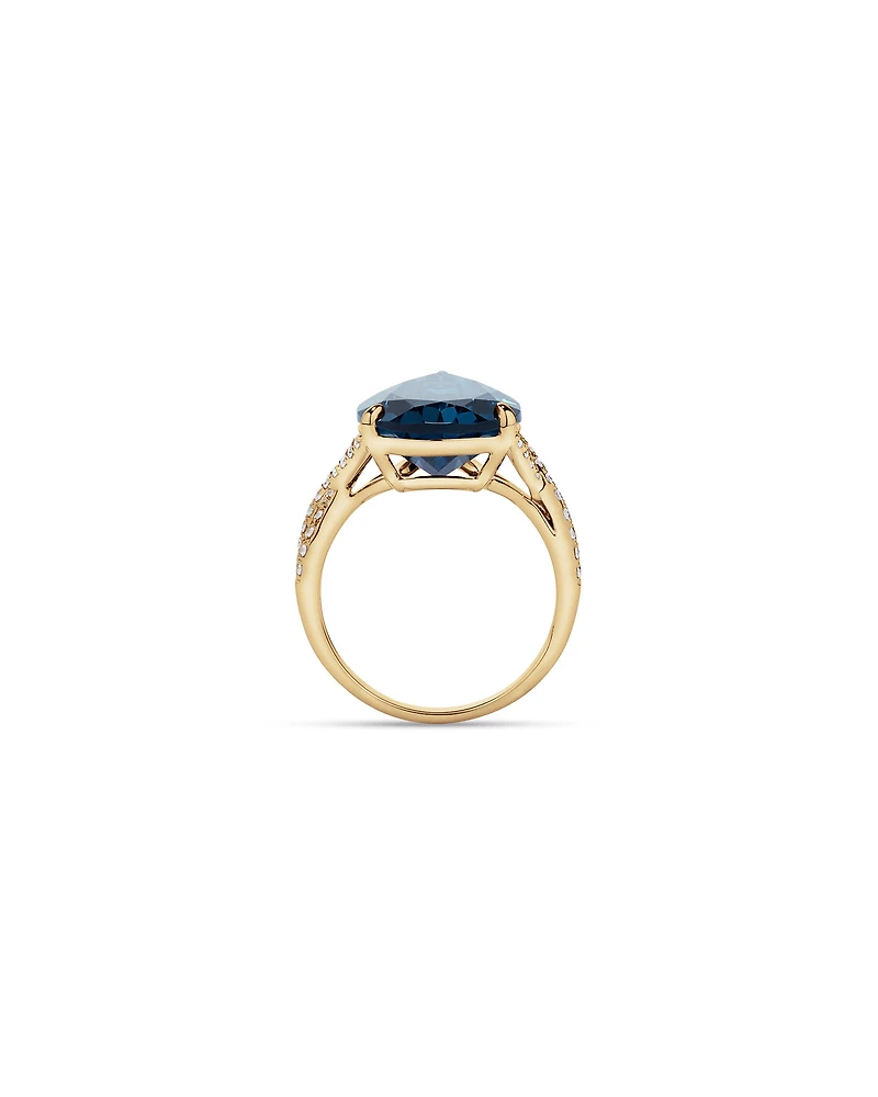 Pear Cut London Blue Topaz & 0.28 Carat TW Diamond Twist Ring 10kt Yellow Gold