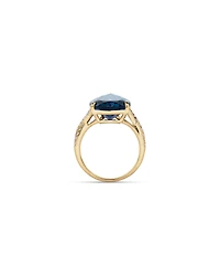 Pear Cut London Blue Topaz & 0.28 Carat TW Diamond Twist Ring 10kt Yellow Gold