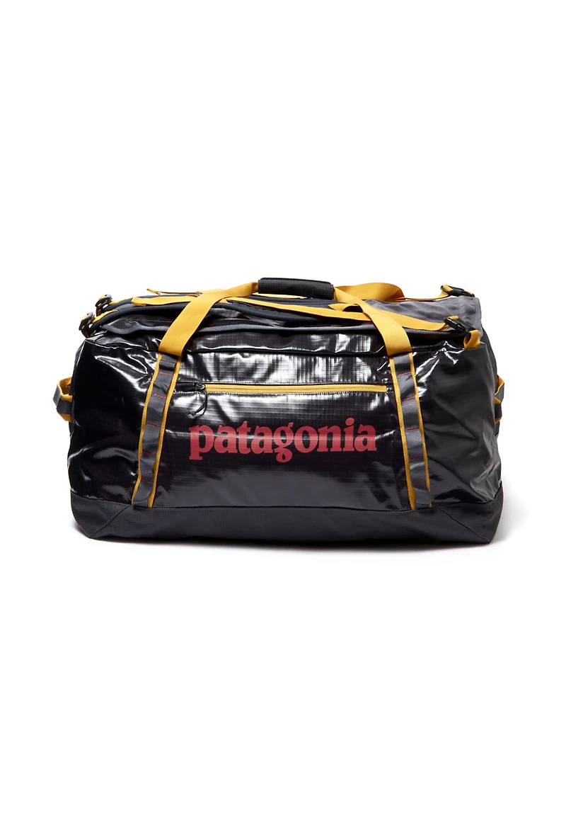 patagonia golden jungle black hole Duffel Bag 70L (Pufferfish Gold) Summits Outdoor This large Black Hole Duffel easily swallows a weeks worth of stuff The Patagonia Black Hole Collection