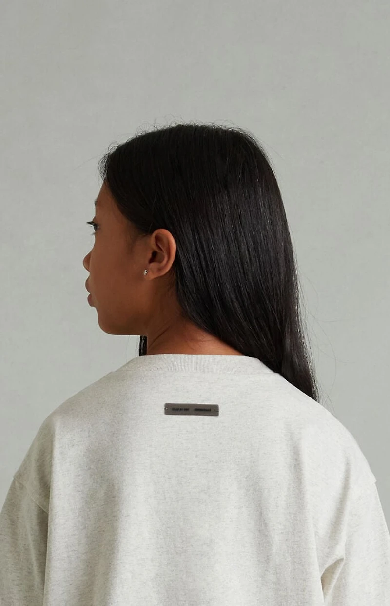 Fear of God ESSENTIALS Kids Heather Oatmeal Classic Short Sleeve T-Shirt