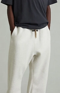Fear of God ESSENTIALS Kids Heather Oatmeal Flare Sweatpants