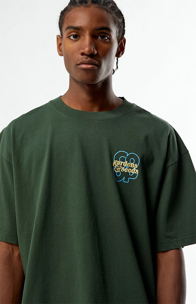 GARDENS & SEEDS Co-Op Statement Flower T-Shirt
