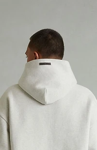 Fear of God ESSENTIALS Heather Oatmeal Embossed Classic Hoodie