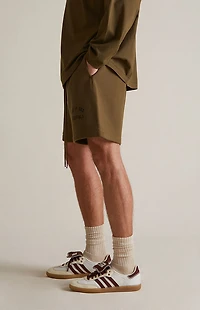 Fear of God ESSENTIALS Olive Fleece Soccer Sweat Shorts