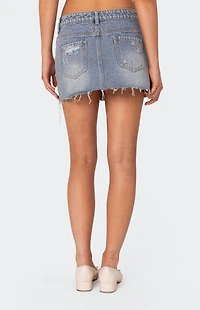 Edikted Ginnie Low Rise Distressed Denim Mini Skirt