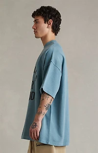 Fear of God ESSENTIALS Faded Coastal Campus '90s Short Sleeve T-Shirt
