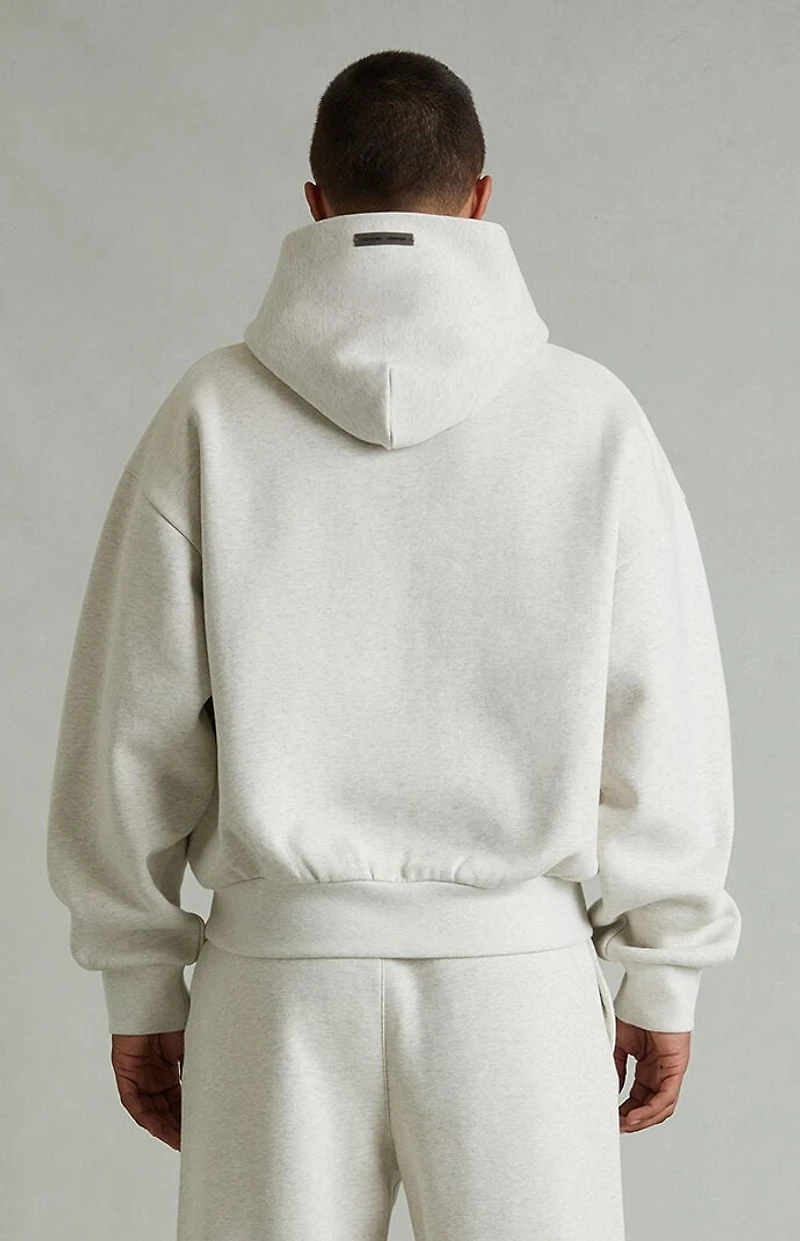 Fear of God ESSENTIALS Heather Oatmeal Embossed Classic Hoodie