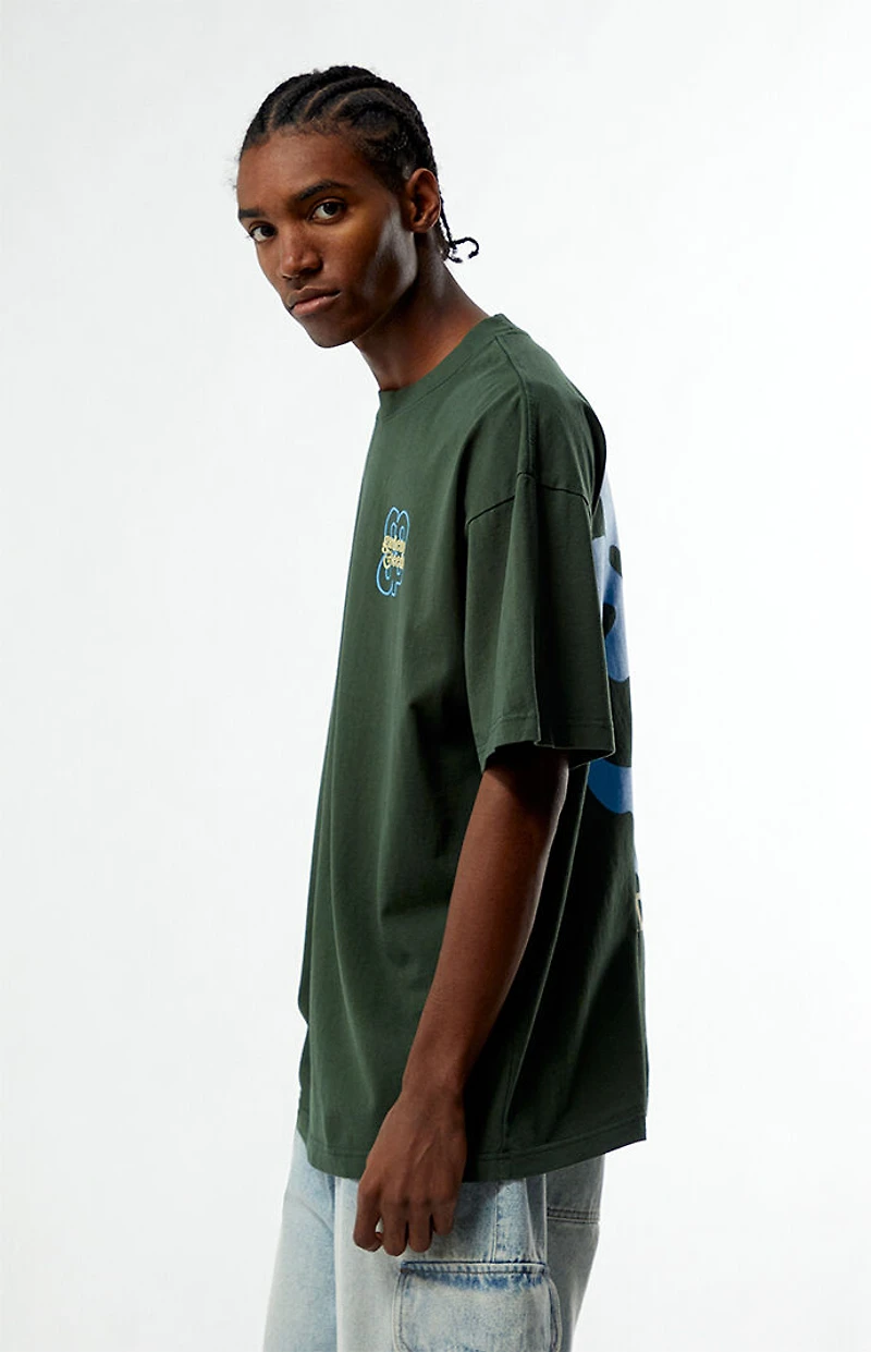 GARDENS & SEEDS Co-Op Statement Flower T-Shirt