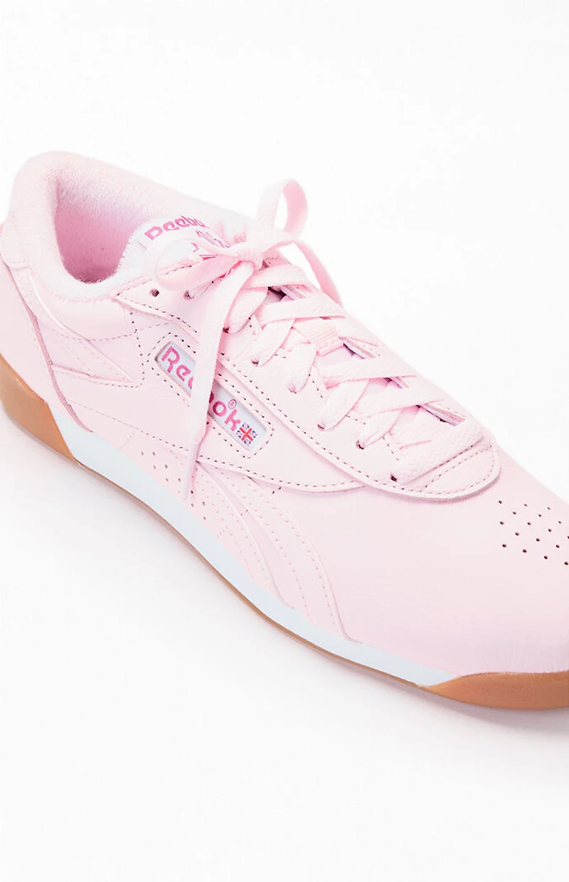 Reebok Women's Pink Freestyle Lo Sneakers