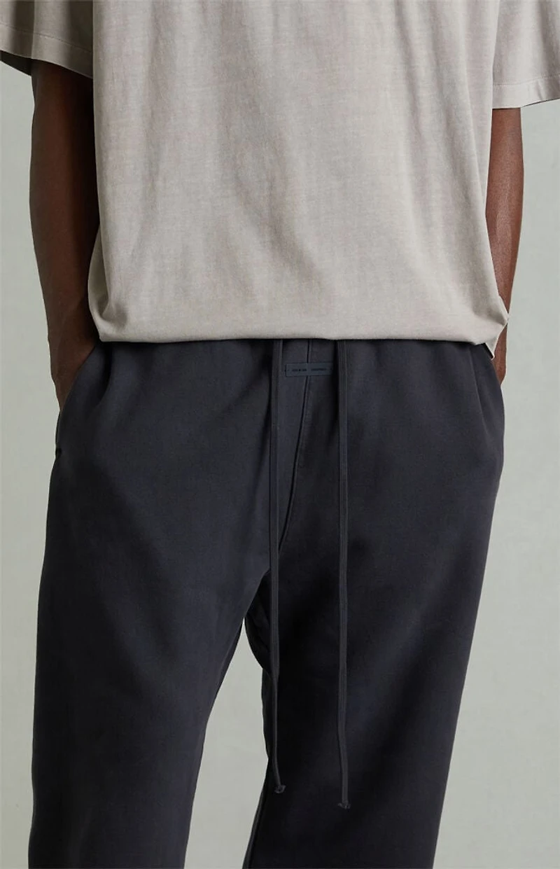 Fear of God ESSENTIALS Vintage Black Fleece Flare Sweatpants