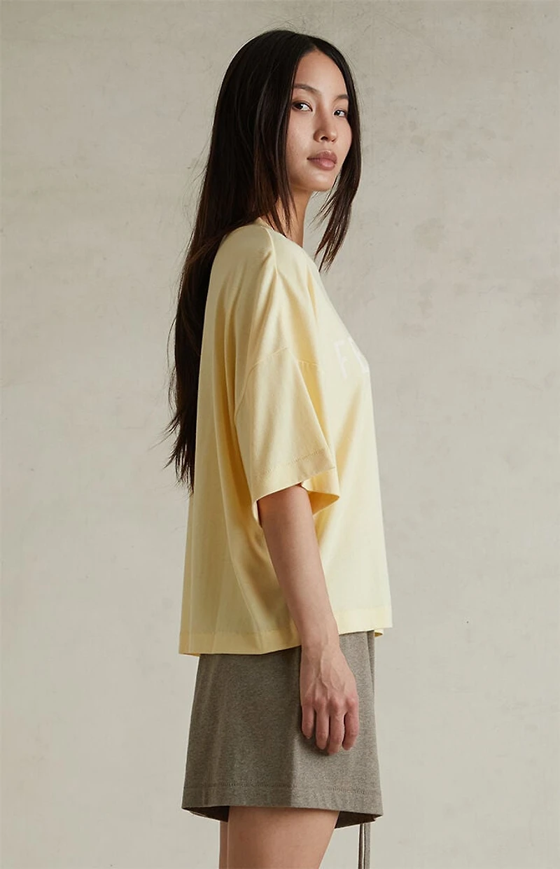 Fear of God ESSENTIALS Women's Garden Yellow Boxy T-Shirt