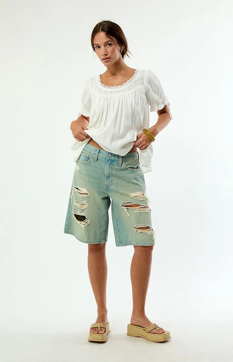 Levi's Light Blue Ripped Middy Jorts