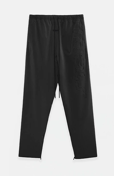 Fear of God ESSENTIALS Vintage Black Active Trace Baggy Track Pants