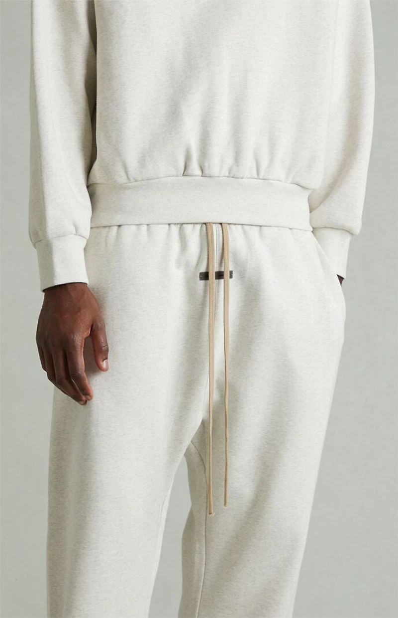 Fear of God ESSENTIALS Heather Oatmeal Fleece Flare Sweatpants