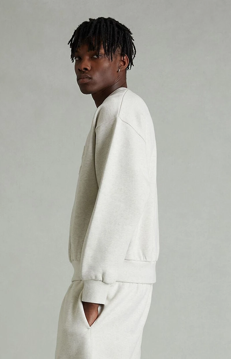 Fear of God ESSENTIALS Heather Oatmeal Embossed Classic Crew Neck Sweatshirt