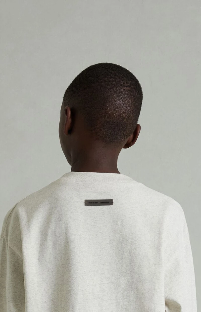 Fear of God ESSENTIALS Kids Heather Oatmeal Classic Long Sleeve T-Shirt
