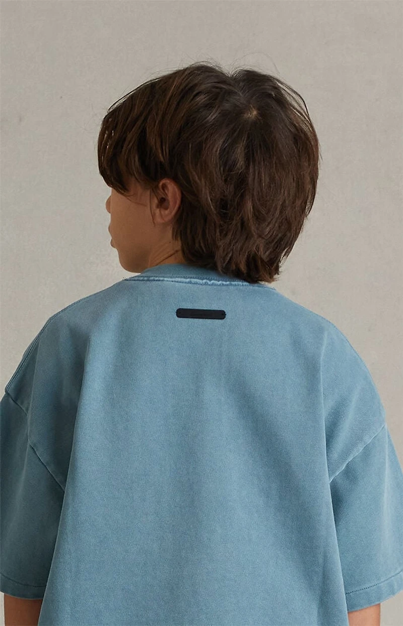 Fear of God ESSENTIALS Kids Faded Coastal Campus ’90s Short Sleeve T-Shirt