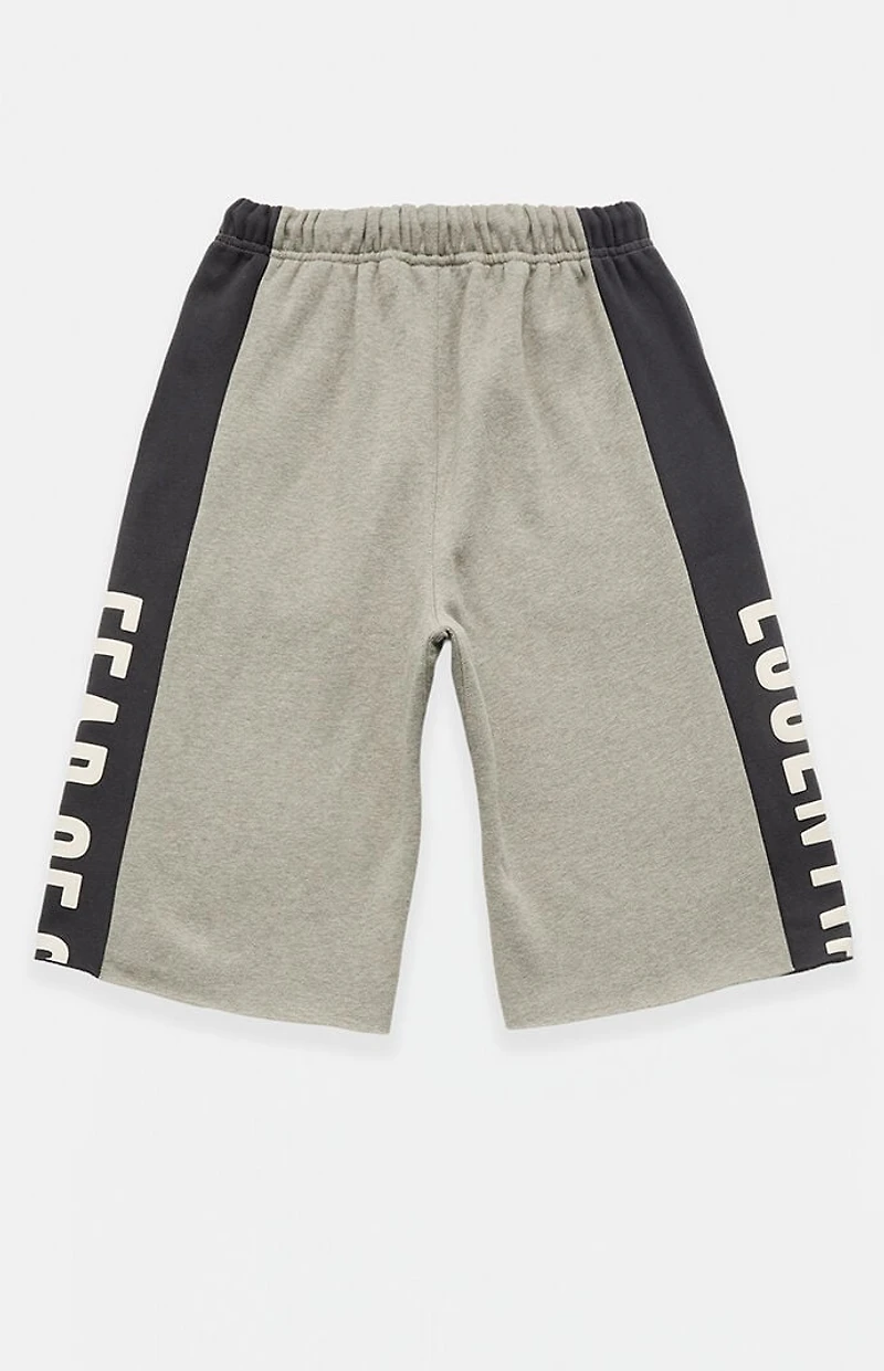 Fear of God ESSENTIALS Seal Paneled Raw Cutoff Sweat Shorts