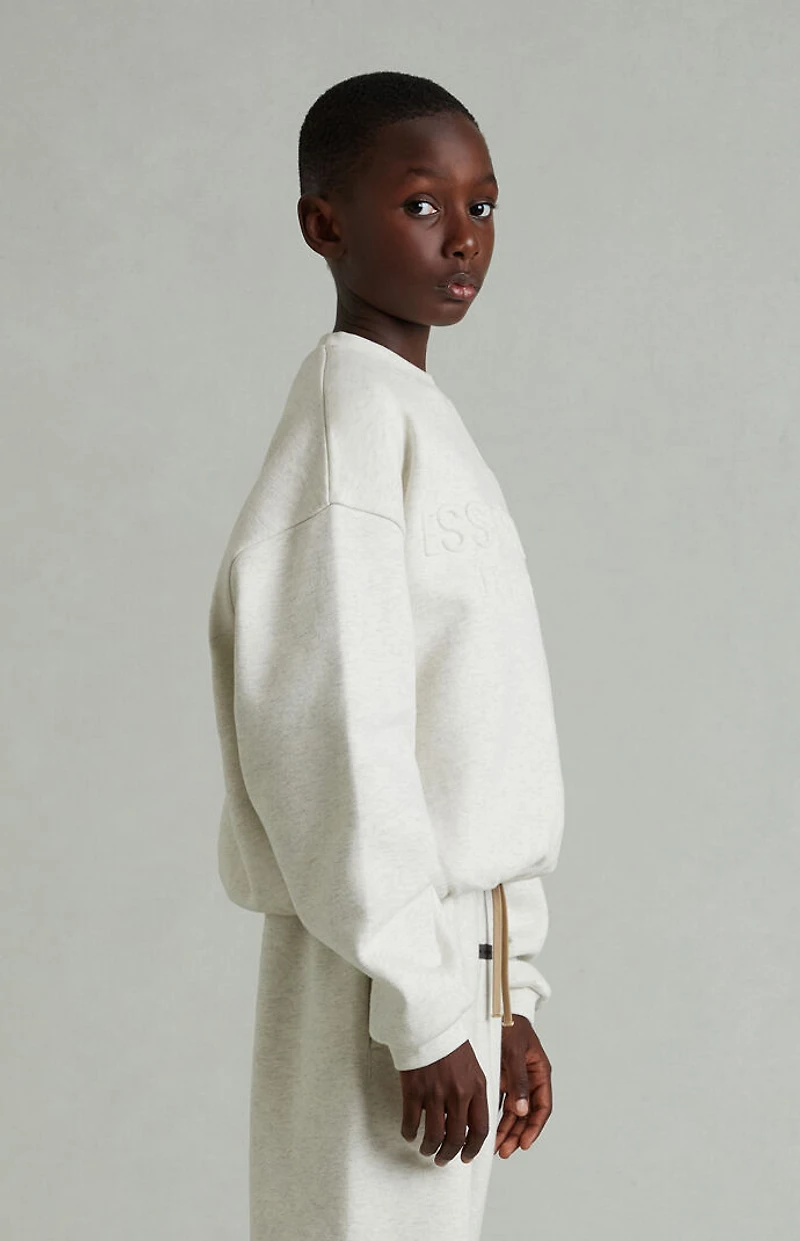 Fear of God ESSENTIALS Kids Heather Oatmeal Embossed Classic Crew Neck Sweatshirt