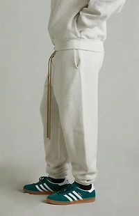 Fear of God ESSENTIALS Heather Oatmeal Classic Fleece Sweatpants