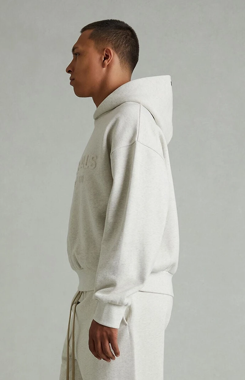 Fear of God ESSENTIALS Heather Oatmeal Embossed Classic Hoodie