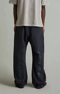 Fear of God ESSENTIALS Vintage Black Fleece Flare Sweatpants