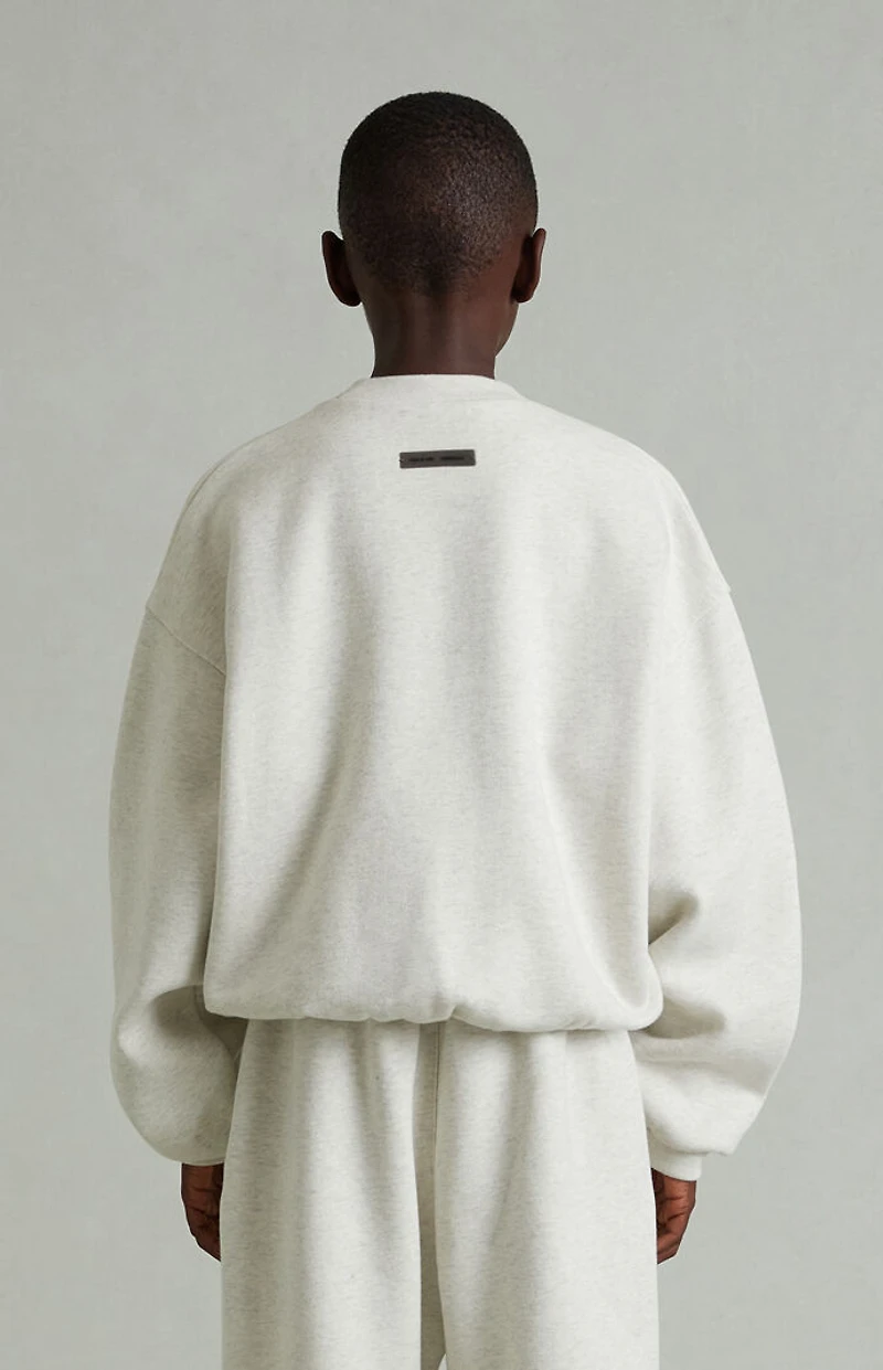 Fear of God ESSENTIALS Kids Heather Oatmeal Embossed Classic Crew Neck Sweatshirt