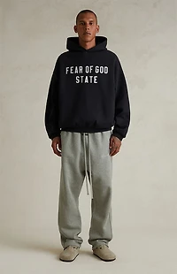 Fear of God ESSENTIALS Jet Black '90s Fit Fleece Hoodie